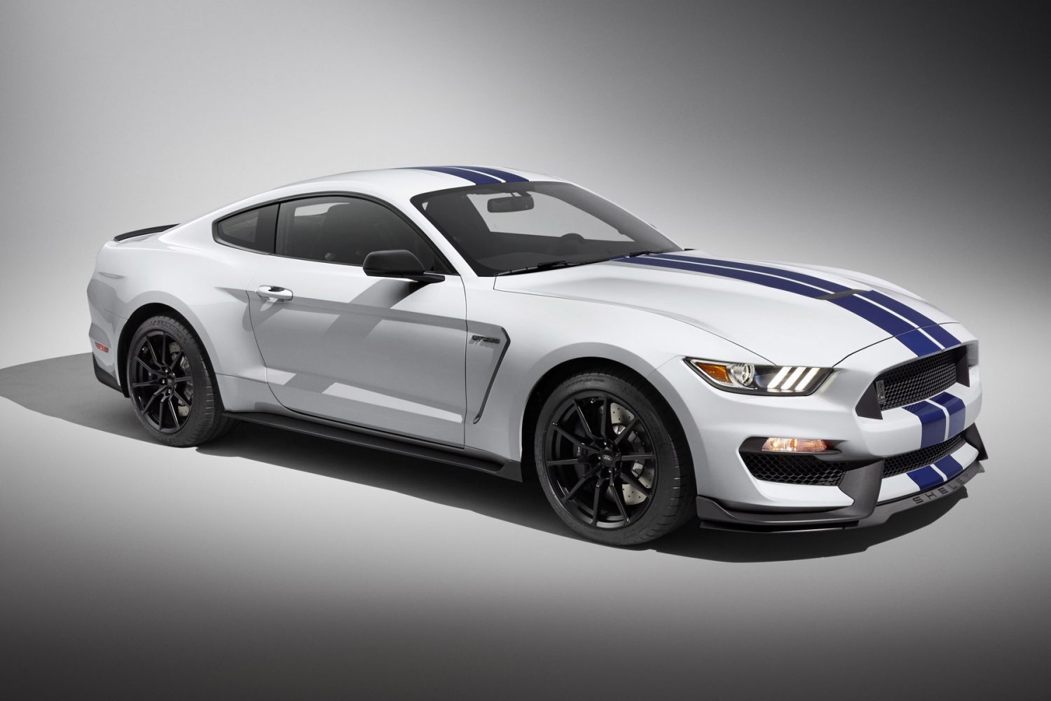 The All-new Shelby GT350 Mustang in Oxford White with a Sonic Blue stripe.